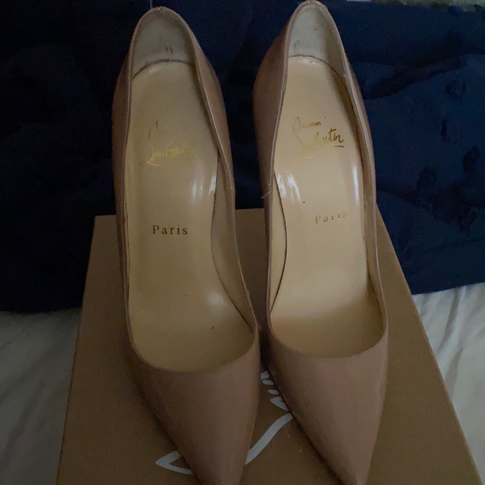 Christian louboutin scrap on the red bottom from walking good  condition
